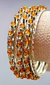 Set of 7 Brilliant Silver & Amber Stacked Bangles Bracelets Plus 9.5” NWT - Picture 1 of 5