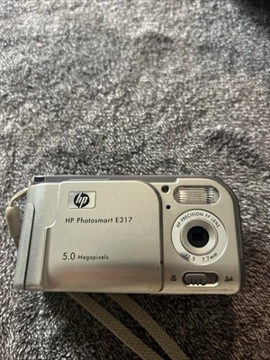 HP PhotoSmart E317 5.0MP Digital Camera - Silver Tested Working - Image 1 of 4
