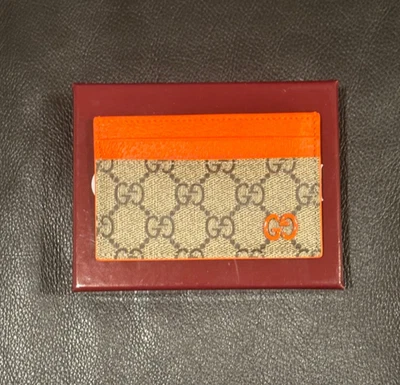 Carteira porta-cartões Gucci laranja e bege com lona GG e couro laranja - Imagem 1 de 4
