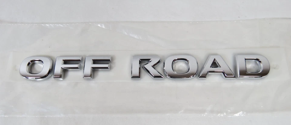 2005-2010 Nissan Xterra Pathfinder Off Road Emblem Front Door Badge Genuine OEM - Image 1 of 4
