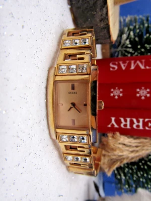 Guess, rhinestones, gold tone women watch Wear it or resale New battery Lot B4 - Image 1 of 4