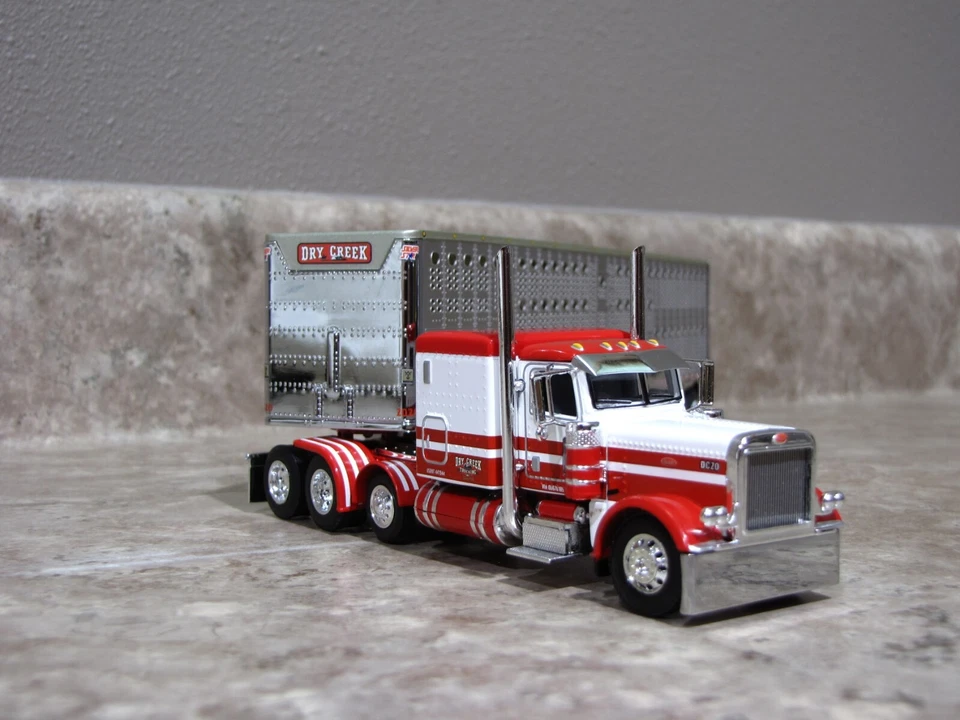 DCP 1/64 Dry Creek Red White Tri-Axle Peterbilt 389 Wilson Livestock 60-1050 - Image 1 of 4