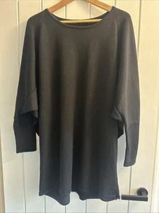 COS schöner schwarzer Pullover aus 100% Merinowolle mit ausgestellten Ärmeln, Größe L - Bild 1 von 7