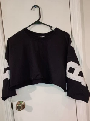 Camiseta deportiva de moda Nova B*tch para damas grande negra cosida corta Spirit. Foto 1 de 3