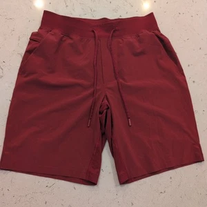 Lululemon Men’s Red Athletic Shorts Size Medium Athleisure Gym Workout GUC - Picture 1 of 10