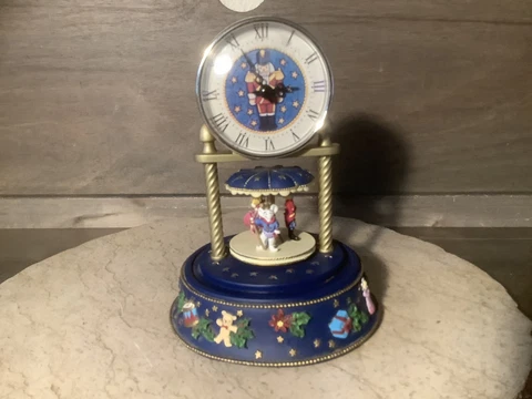 CHIRSTMAS TIN SHOULDER CLOCK AND MUSIC BOX 7" TALL BLUE AND GOLD Cover
