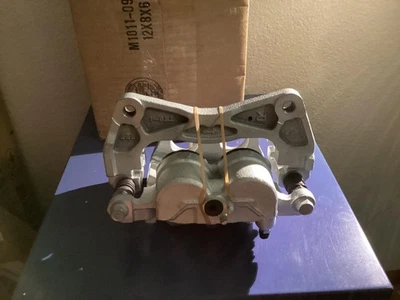 Pinza de freno delantera derecha genuina OEM NUEVA 26292AG042 modelos Subaru Foto 1 de 4