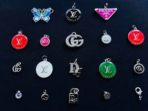 Emblem Pull  charms stamped  lot of 18  mix  Gucci  dior - Picture 1 of 10