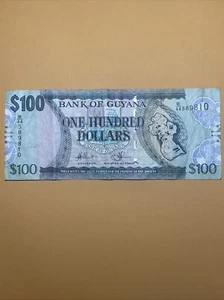 Guyana 100 Dollars Circulated Paper Money - 2006 Issue P#36 (Sig #2) - Picture 1 of 4