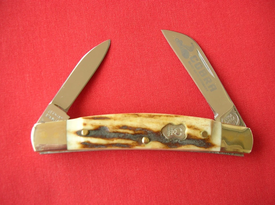 CUCHILLO BUCK CREEK COBRA 2 HOJAS MEDIO CONGRESO CIERVO ASAS G Foto 1 de 4