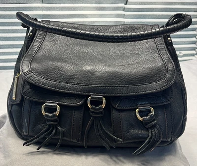 Antonio Melani Black Hobo Shoulder Bag Tassels Braid Front Pockets Flap Closure - Image 1 of 4