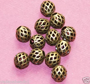 20 Antiqued Brass round filigree beads 8x7mm, antique bronze beads - Bild 1 von 2