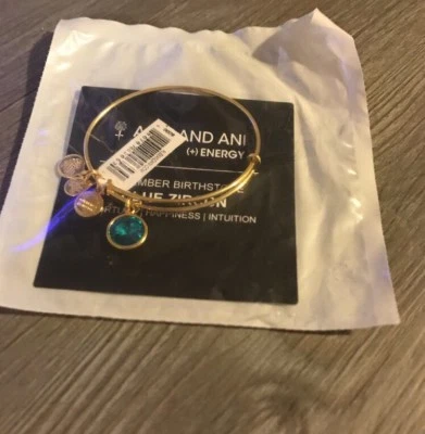 Alex And Ani  Crystal Birthstone December  Blue Zircon. Yellow Gold - Image 1 of 2