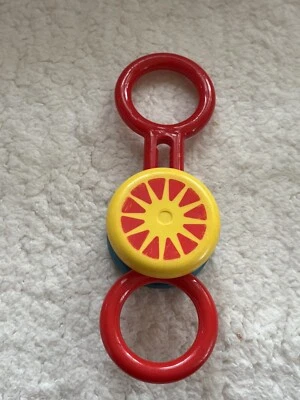 Juguete de sonajero de plástico para bebé Johnson & Johnson Playpath de colección rojo, azul, amarillo Foto 1 de 2