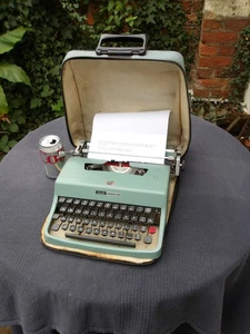 Máquina de escribir manual Olivetti Lettera y estuche - probado y funcionando ver muestra mecanografiado - Imagen 1 de 23