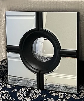 Global View’s Bulls Eye Cross Black Mirror - Image 1 of 2