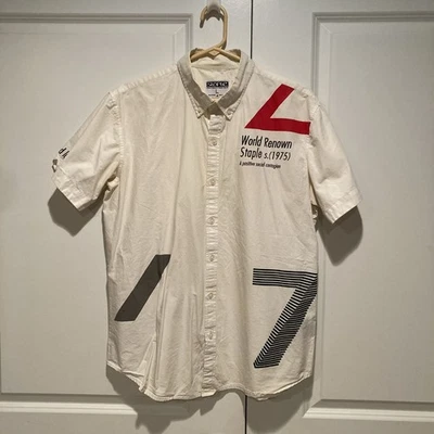 Camisa de manga corta con botones Staple World Renown marca Pigeon blanca roja talla L Foto 1 de 4