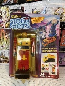 Road Bots: Loaderr gelb/rote Variante komplett Marchon Transformers On Card - Bild 1 von 6