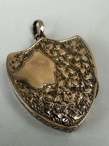 Colgante ovalado de oro rosa/amarillo de 9 quilates de 0,375 disponible en todo el mundo - Imagen 1 de 12