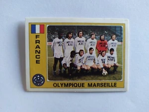 FIGURINA EURO FOOTBALL 76 PANINI SQUADRA OLYMPIQUE MARSEILLE n 97 CON VELINA - Imagen 1 de 2