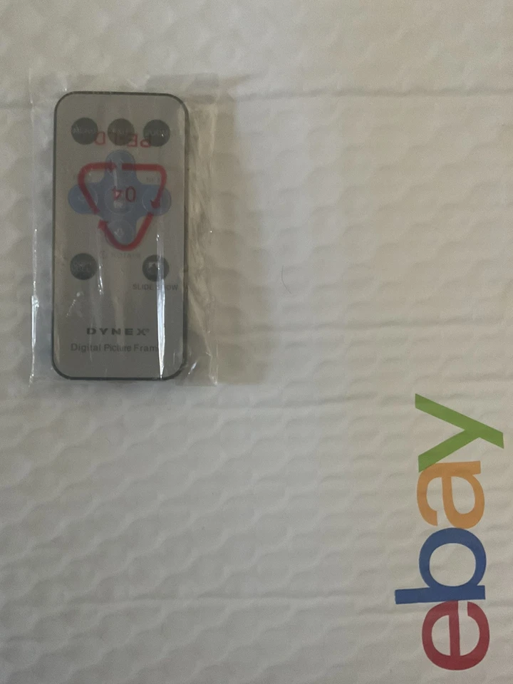 Brand new Sealed Genuine DYNEX DIGITAL PICTURE FRAME Remote Control 7120A - Image 1 of 1