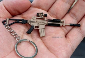 mini  gun M4A1  weapon metal  keychain toy gift 9cm - Picture 1 of 2