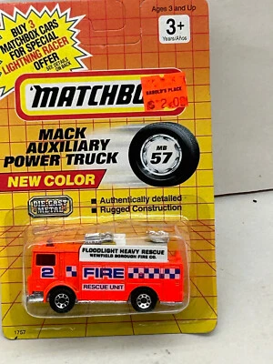 1991 MATCHBOX SUPERFAST MB57 MACK AUXILIARY POWER TRUCK FIRE UNIT NEW ON CARD - Image 1 of 4
