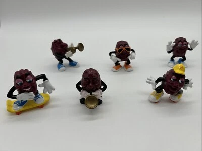 Lote de 6 figuras vintage de PVC de California Raisins años 80 saxofón patinador trunpret Foto 1 de 4