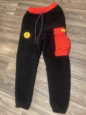 Jordan Essentials Mountainside Statement Fleece Pants Jogger Black Red yellow   - Image 1 of 4
