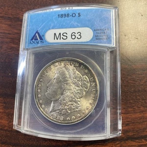 1898 O MORGAN SILBER DOLLAR ANACS MS 63 (Etui ist zerkratzt keine Münze) - Bild 1 von 4
