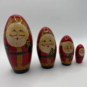 Juego de 4 muñecas navideñas rusas de madera pintadas a mano vintage de Papá Noel - Imagen 1 de 6