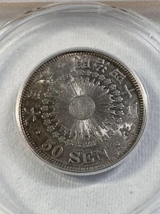 1909 Japan 50 Sen Silver Coin Graded AU 55 by ANACS - Picture 1 of 4