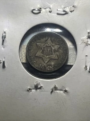 ￼1858? Not Quite Sure Maybe A 8? Silver Three Cent Nickel Piece With Dodge Chip - Image 1 of 3