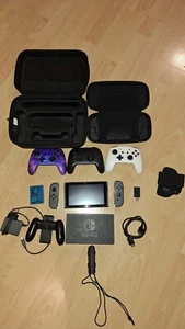 Nintendo Switch Set mit Zubehör und Spielen – Komplettpaket - Bild 1 von 18