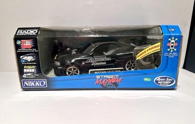 Nikko Nissan Skyline GT-R  R34 Street Mayhem Tuner Drift Car Black RC - Image 1 of 4