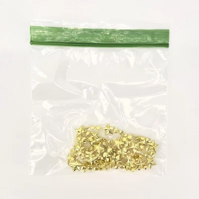 Guirnalda de cuentas doradas calendario de Adviento Avon Christmas Is Coming de colección  Foto 1 de 4