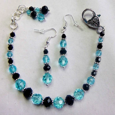 NFL CAROLINA PANTHERS   CRYSTAL EARRINGS & BRACELET SET, SUPERBOWL TEAM,  M -L - Image 1 of 4