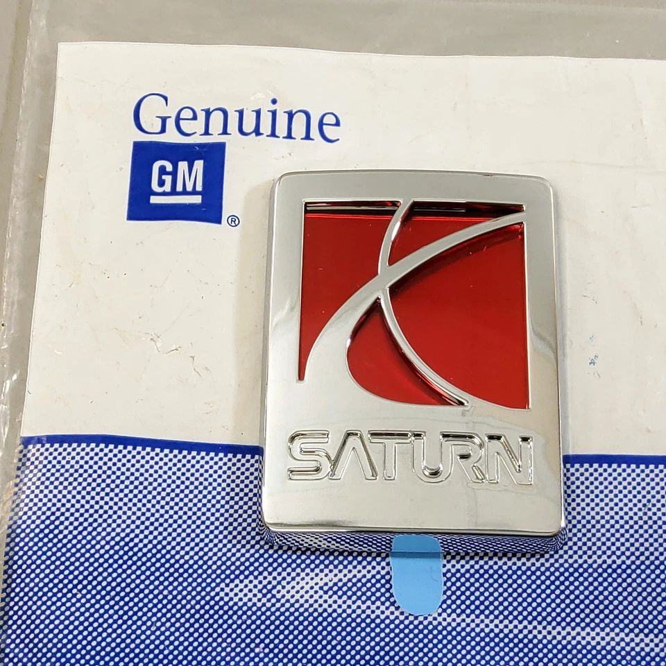 Nuevo emblema de puerta delantera con logotipo de GM Saturn 05-07 Saturn Reley se adapta a derecha/derecha Foto 1 de 4