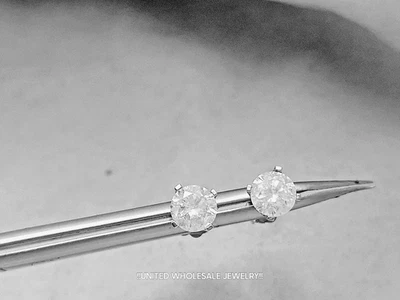 Aretes redondos naturales genuinos de diamantes de 1,42 quilates en oro blanco sólido de 14 quilates Foto 1 de 4