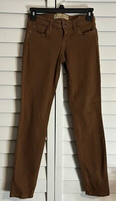 Pantalones de mezclilla Guess Power ultra ajustados marrones talla 24 elásticos suaves otoño moda Foto 1 de 4