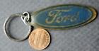 1980s Era Lynbrook New York oval shaped Crown Ford Motor Cars metal keychain----