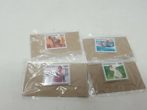 Lot of 4 1984 OLYMPIC PIN SPORTS STAMP PINS Jesse Owens eddie eagan hazel (y - Picture 1 of 4