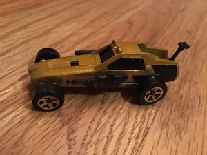1982 HOT WHEELS - CLASSIC GOLD 447 ENFORCER SHOOTER DIECAST CAR 1/64 - Picture 1 of 2