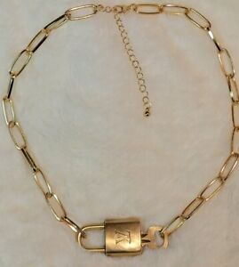 AUTHENTIC Louis Vuitton VINTAGE Padlock & Key pendant