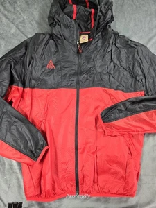 Chaqueta cortavientos Nike ACG para hombre pequeña negra roja con capucha ligera al aire libre - Imagen 1 de 10