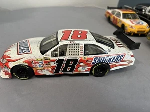 2009 1/24 #18 KYLE BUSCH SNICKERS CAMRY WINNERS CIRCLE - Picture 1 of 12