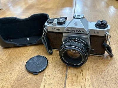 Cámara fotográfica de colección Dasani PENTAX K-1000 SLR con lente de 50 mm, borde marrón raro probado Foto 1 de 4