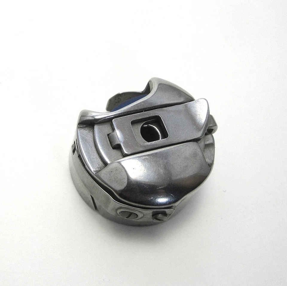 Máquina de coser Bobbin Case #18096 genuina Consew 206RB-5 pie para caminar Foto 1 de 1