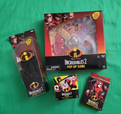 Incredibles 2 Lot of 4 Superhero Gloves w/Sounds Jumbo Cards Puzzle Pop-Up Game - Image 1 of 4