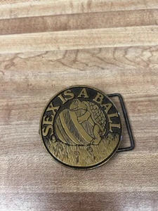 Vintage 1970s Brass Gold Tone Belt Buckle Sex is a Ball Turtle Graphic Novelty - Picture 1 of 4